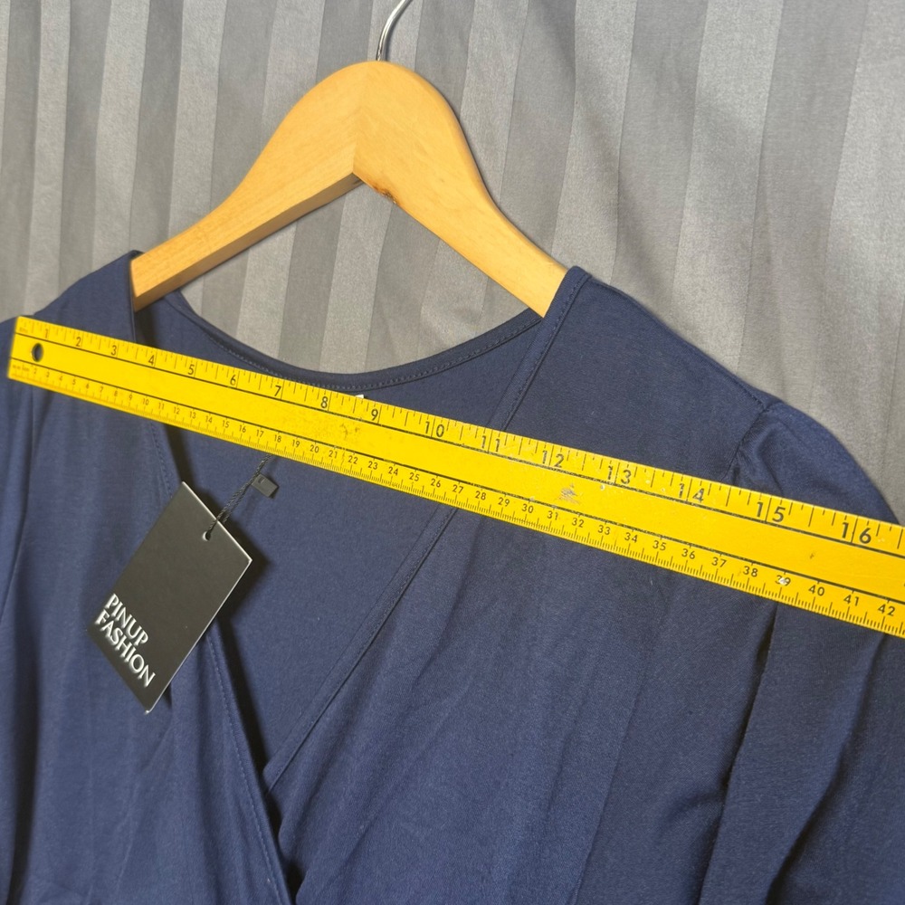 Wrap-Front Peplum Blouse in Navy - Picture 3 of 11